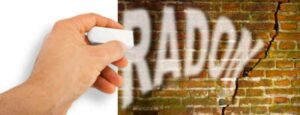 A graphic of a brick wall that reads "Radon"